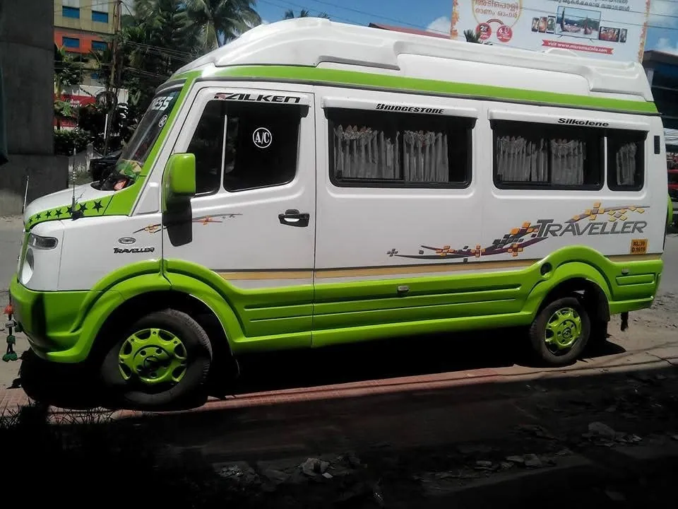 Side view of an Anshaj tempo traveller parked on a street
