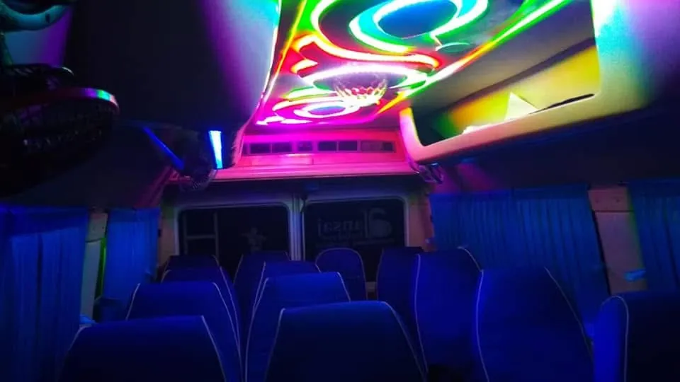 Tempo traveller interior with colourful LED lights