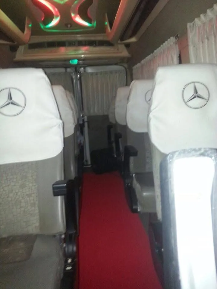 Covered seats inside an Anshaj tempo traveller