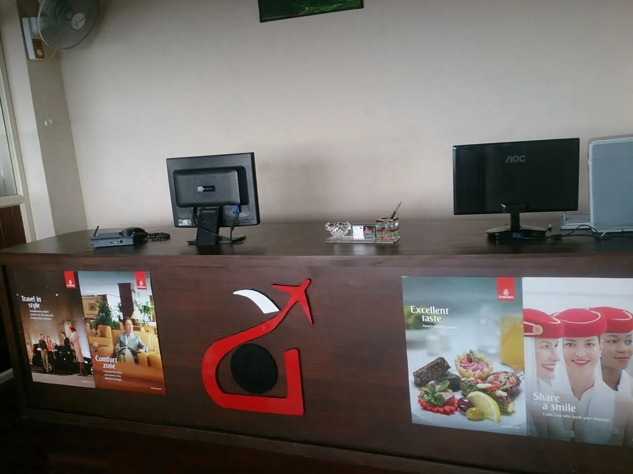 Reception desk with the Anshaj logo