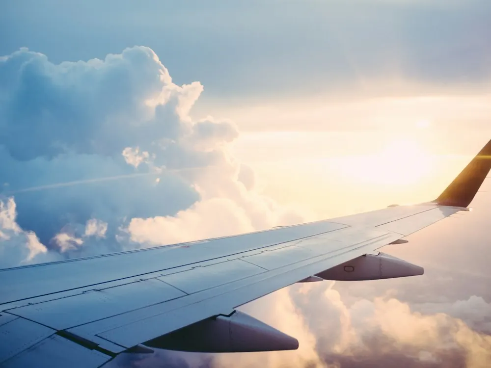 Aircraft wing above the clouds